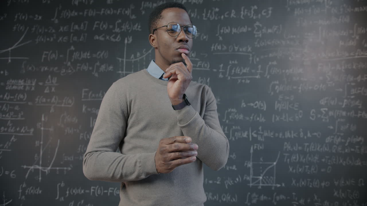 Man Thinking about Mathematics in a Classroom