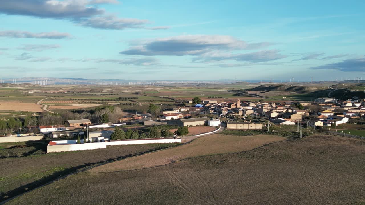 Spanish town of Pozuelo de Aragón with blue sky in aerial view.