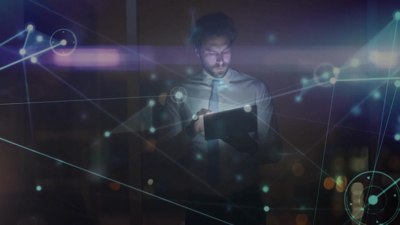 single man tapping tablet screen and exploring network data hologram in technology office