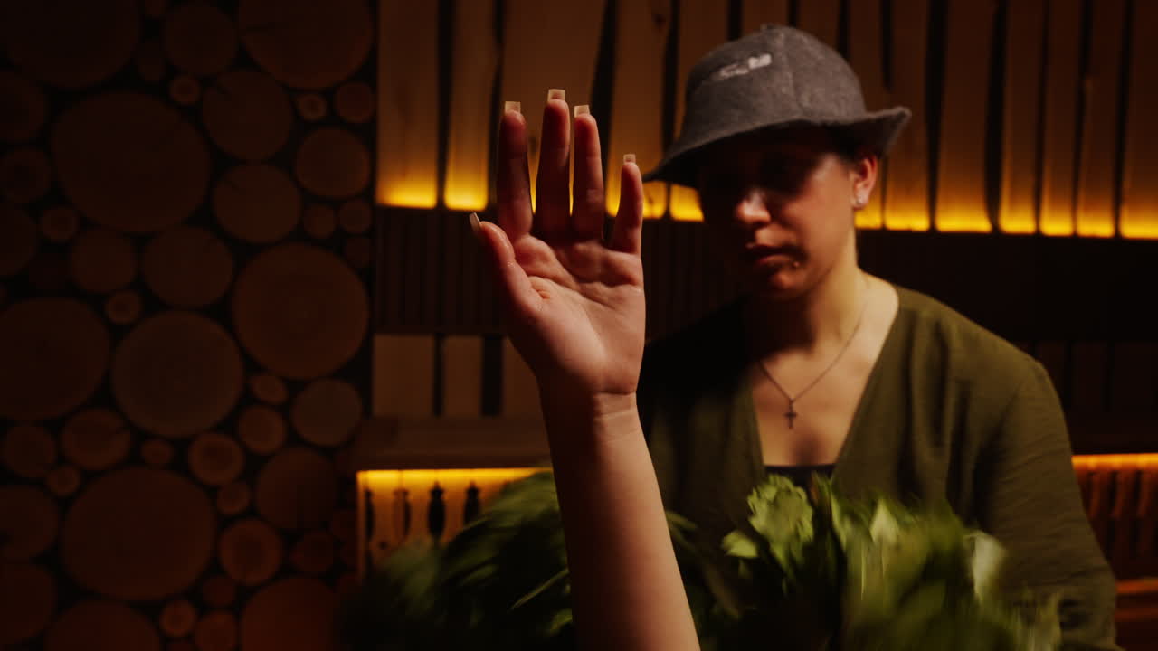Woman getting a traditional sauna treatment