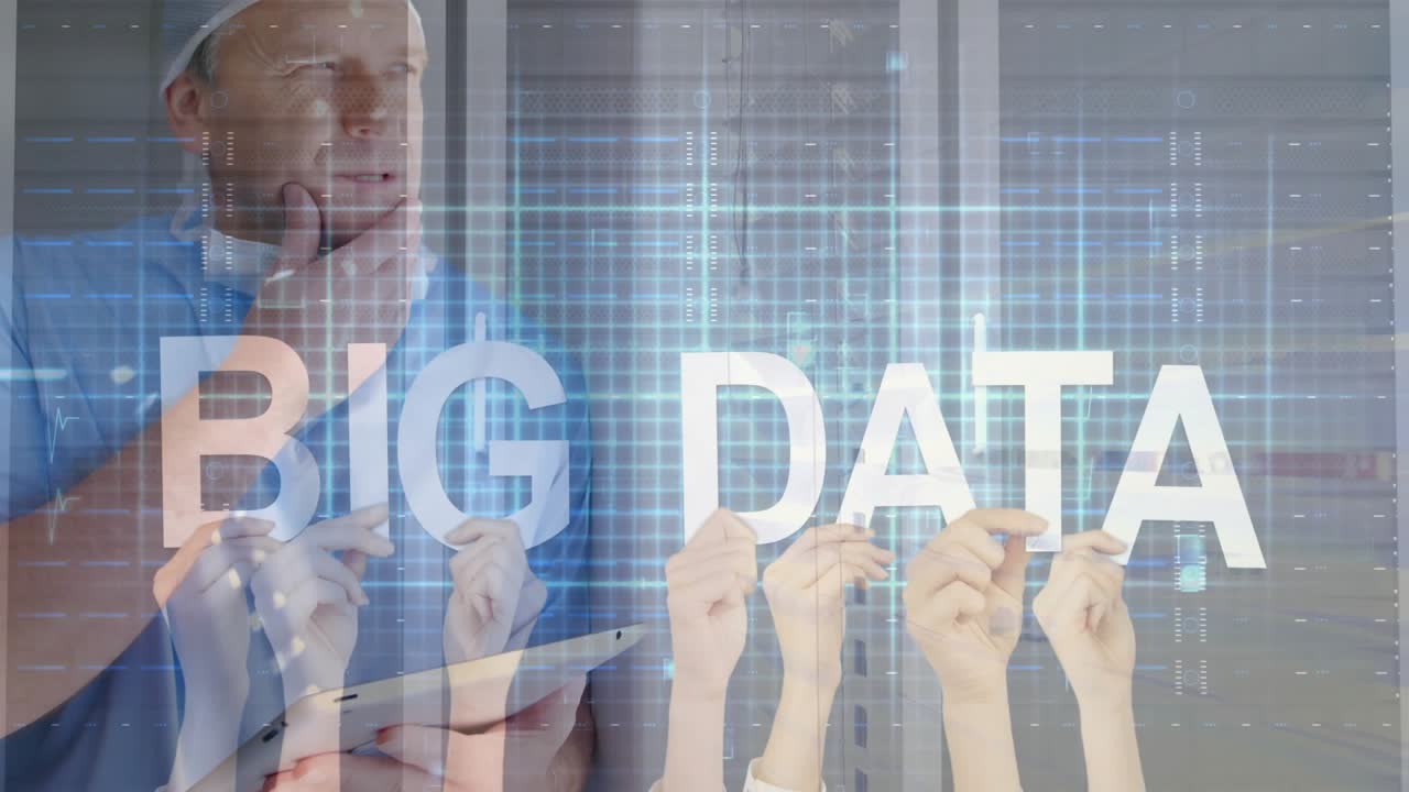Mature man tapping tablet summoning data grid with team aligning BIG DATA letters for presentation