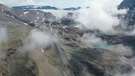 cinematic-flight-between-clouds-and-mountains