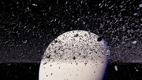saturn surrounded by rings of ice and rock particles in deep space