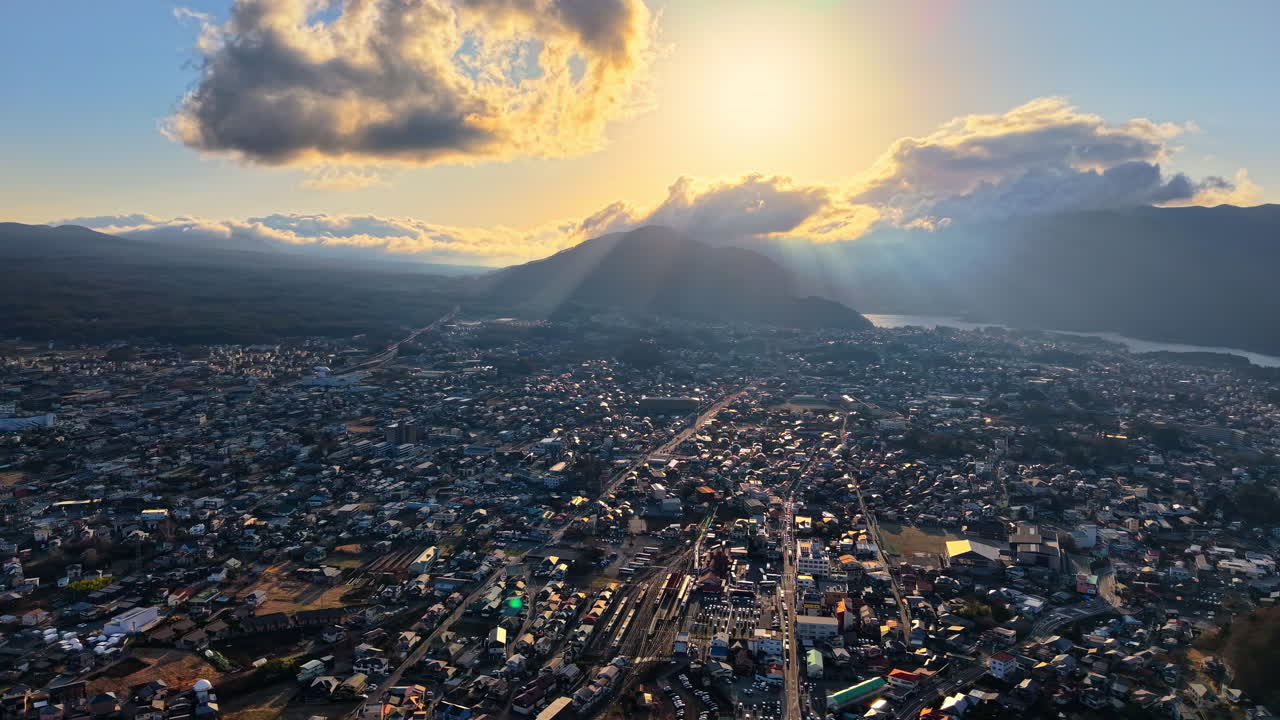 Aerial drone view of the Fujikawaguchiko town, Japan at sunset