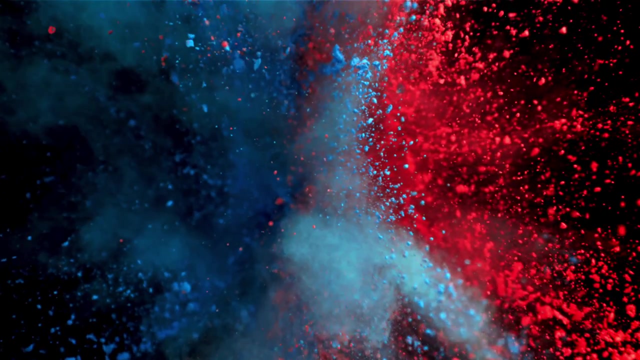 Pó Vermelho e Azul Vibrante Explodindo em Câmera Lenta