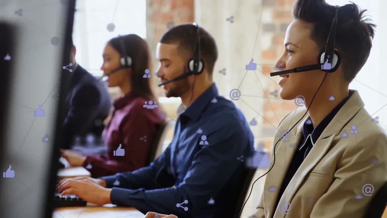 Animation of network of digital icons against biracial woman talking on phone headset at office