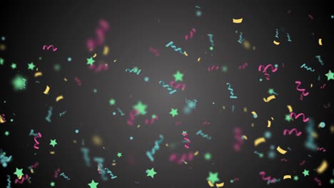 colorful confetti falling down in slow motion over black background.