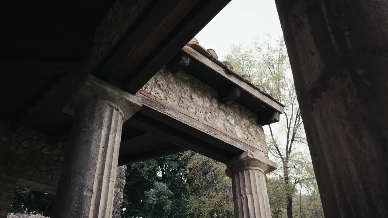 Detailed view of Ancient columns, Pompeii's Gladiators' Barracks, Italy