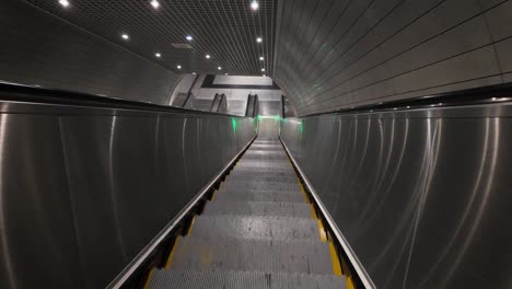 slow motion of escalator that leads from istanbul city center to istanul airport