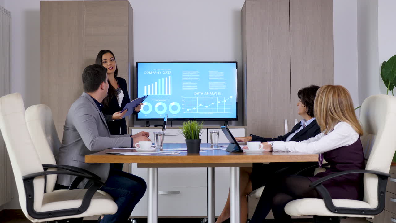 Business meeting with presentation of company data