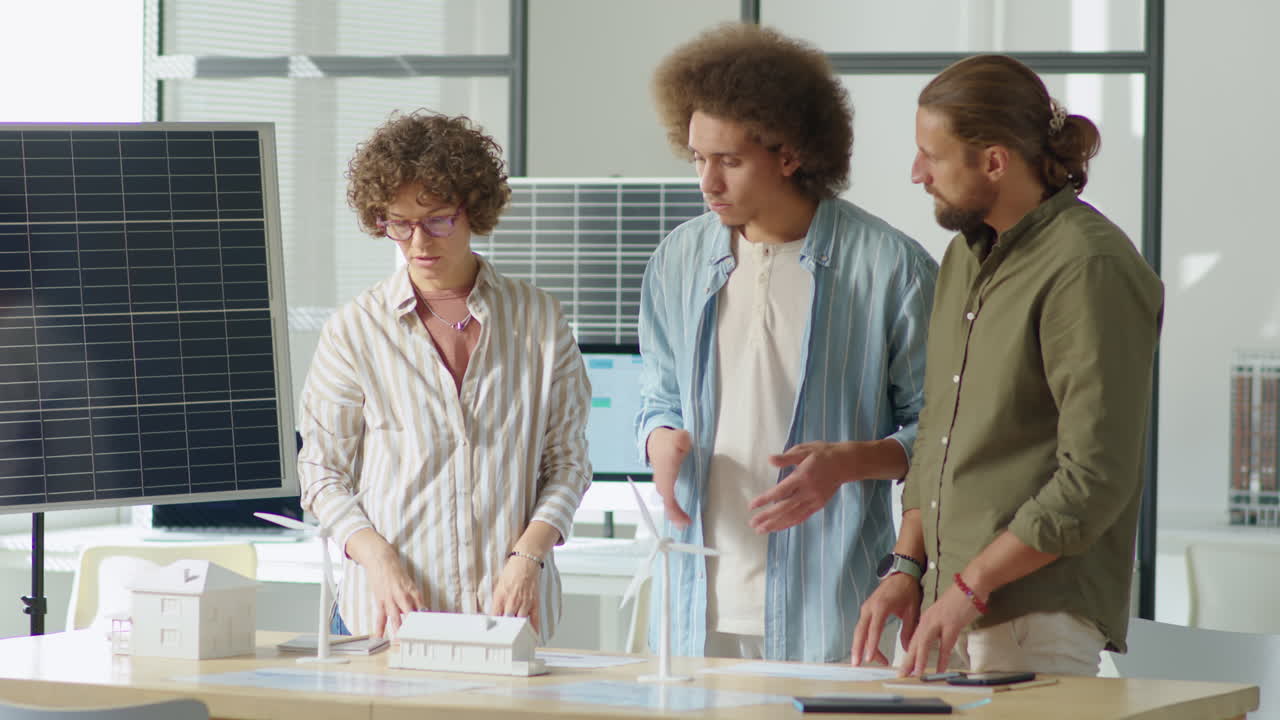 Team of Renewable Energy Developers Discussing Project