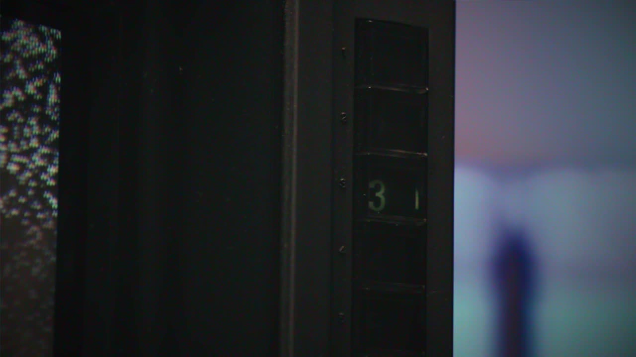 Retro TV, vintage television In a nostalgic setup, a retro TV displays grain on screen, scary halloween night device good for chroma key and green screen. High quality 4k footage