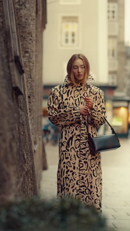 woman in a leopard print coat
