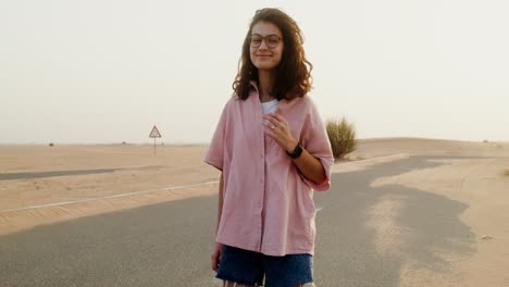 teenage girl in desert landscape