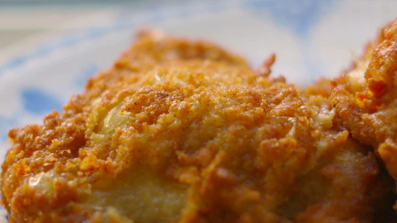 Freshly Cooked Hot Fried Chicken with Thigh and Drumstock Resting Ready to Be Eaten. Delicious Indulgent Fast Food. Quick Protein Dinner or Lunch.
