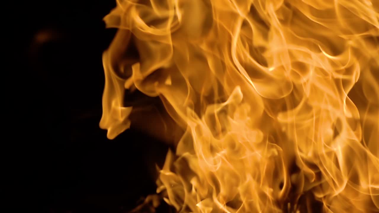 Flames of fire on black background in slow motion