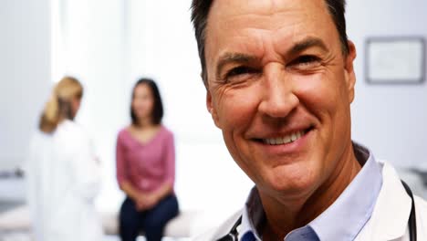 Portrait-of-smiling-male-doctor