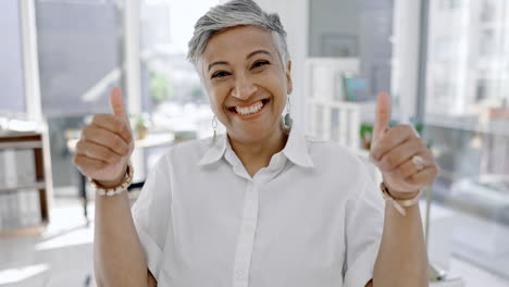 Business-woman,-face-and-thumbs-up-in-office