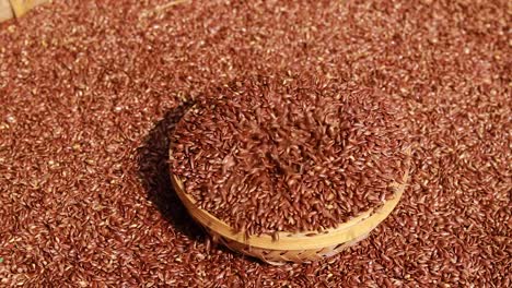 flax seeds in bamboo bowl from top angle at day