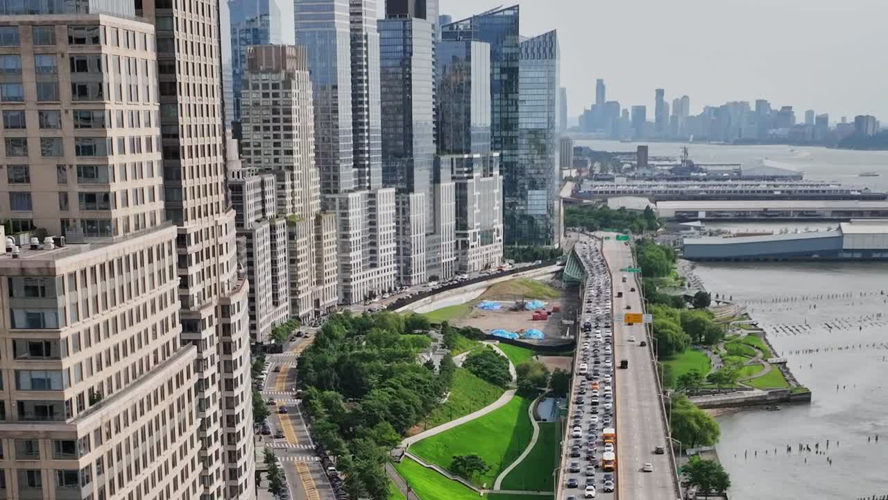 Aerial view of waterfront and city skyline in New York during the day
