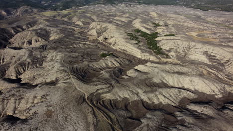 aerial view of terraced hills in a dry landscape