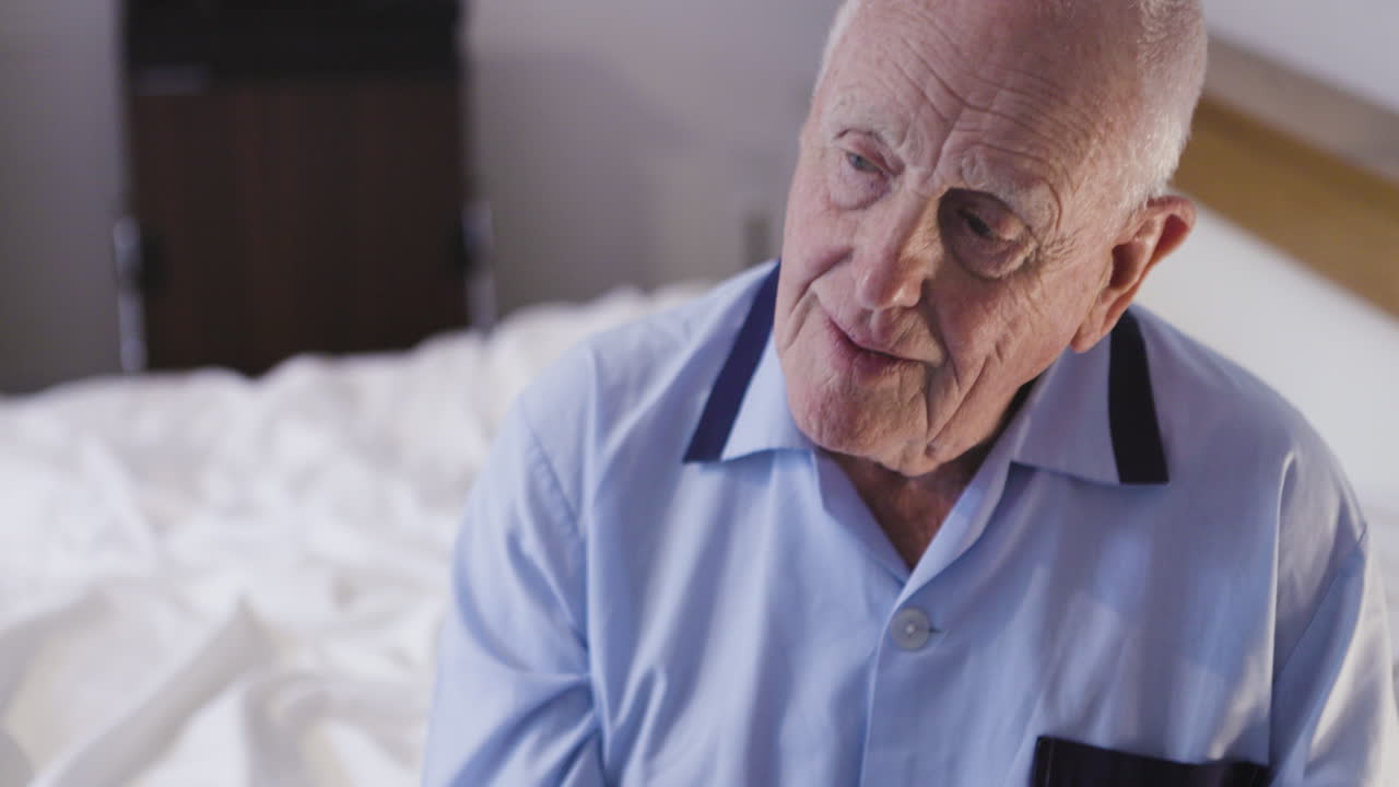 Elderly man having his blood pressure checked