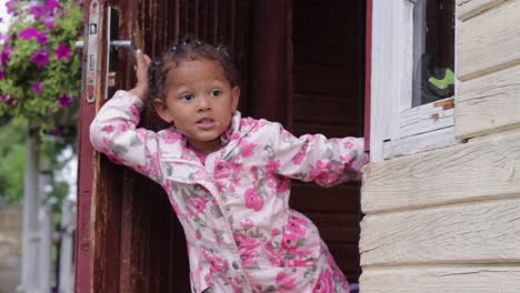 Troublesome-noisy-little-black-child-waiting-for-mom-to-come-home