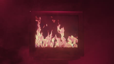 vintage tv with burning flames