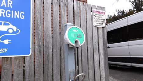 electric van charging at a public station