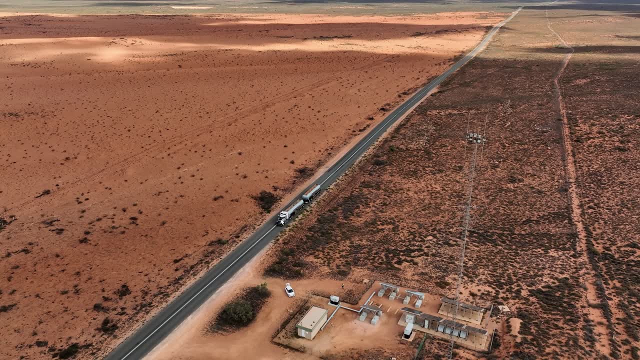 Aerial View Of B Double Tanker Truck Traveling Through Australian Outback.