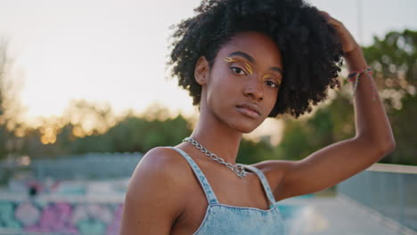 hipster posing at urban street closeup. girl standing city park