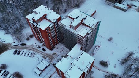 renovation of high rise building in snowy winter