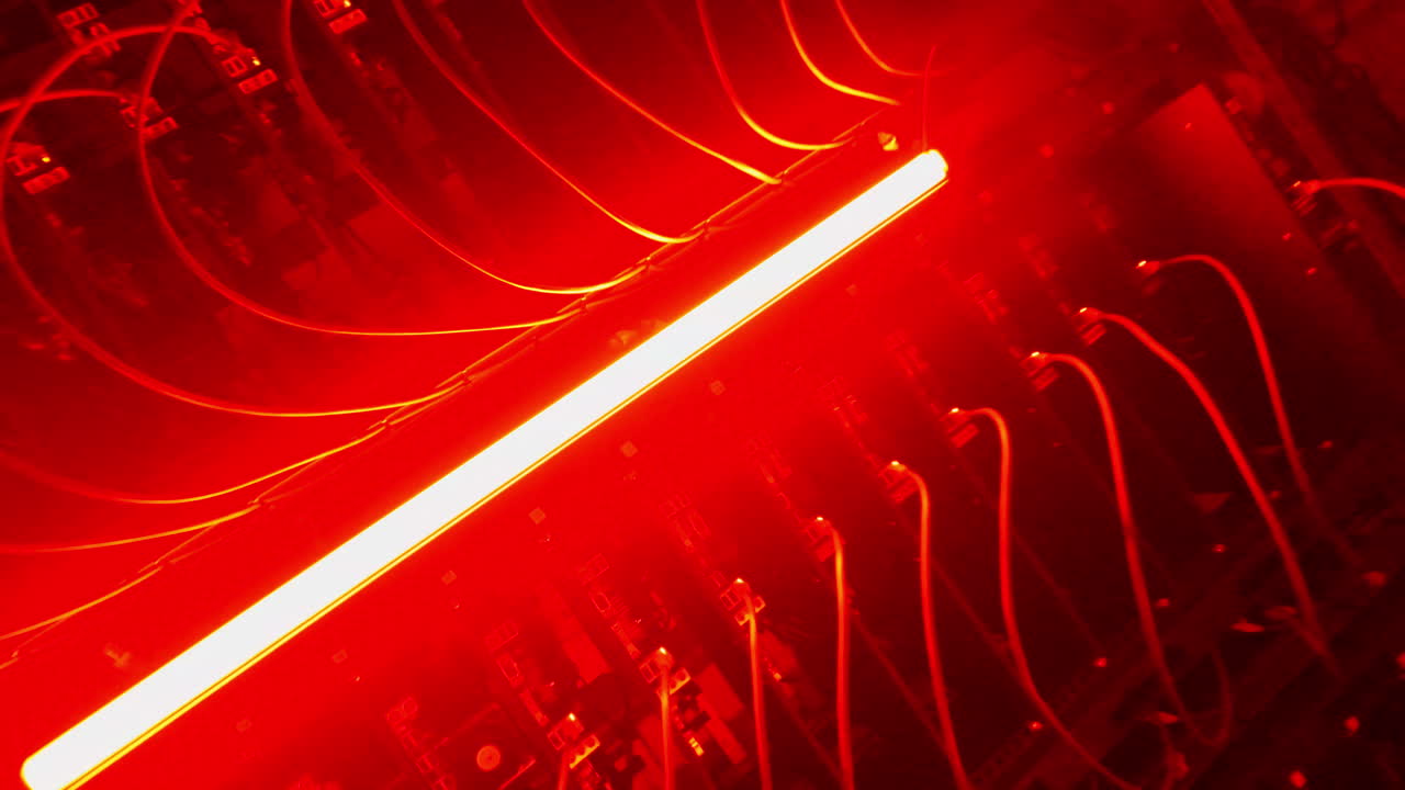 Close up of a server with flashing red lights in a data center