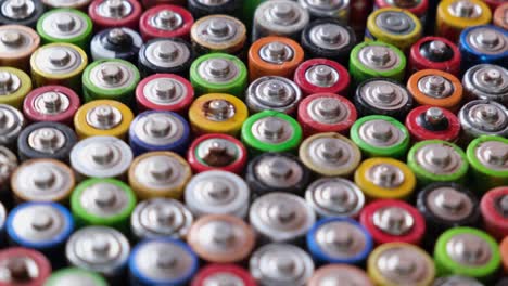 a large number of used batteries which are evenly stacked in the plane a large number of used batteries which are evenly stacked in the plane rotation around the circle of finger batteries