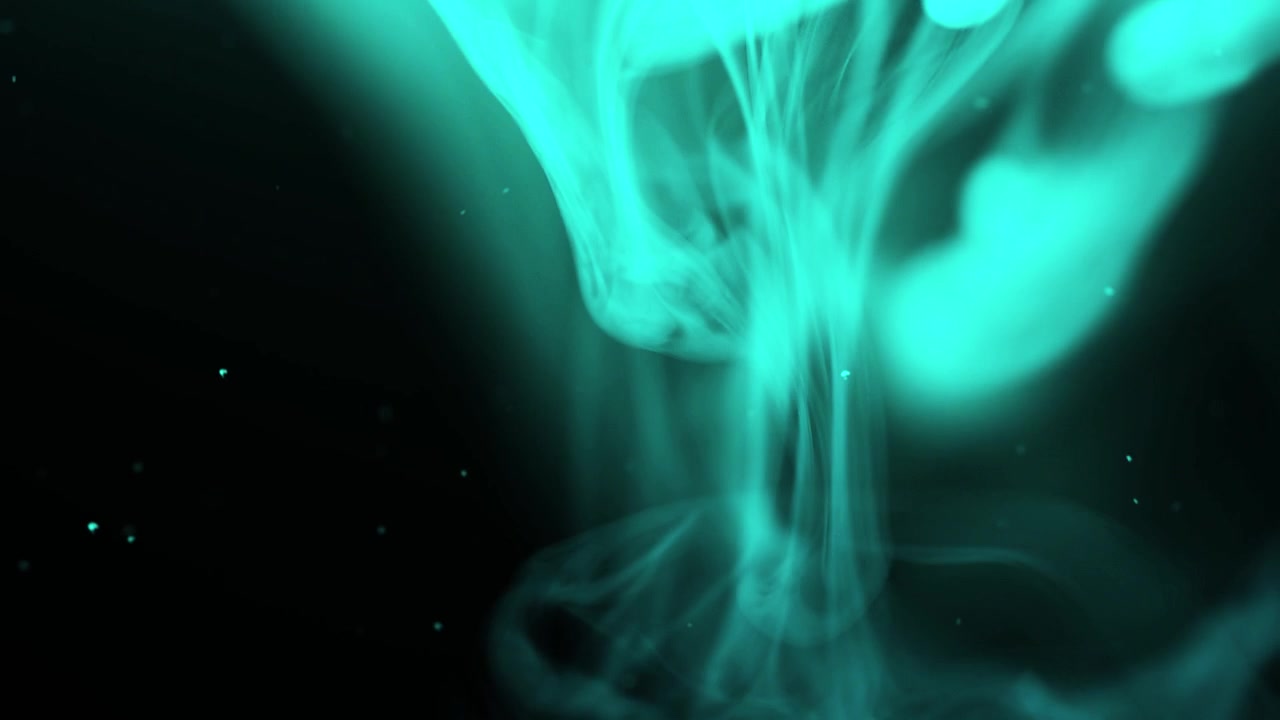 Elegant Wisps of Blue Smoke and Particles Against Black Background