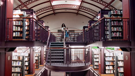 mother and daughter in a library