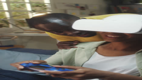 young black couple playing game in vr at home