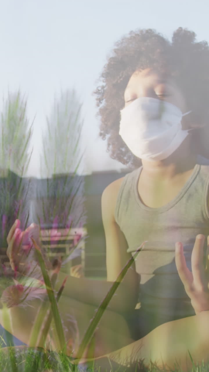 animación de flores sobre diversos niños con máscaras faciales practicando yoga y meditando