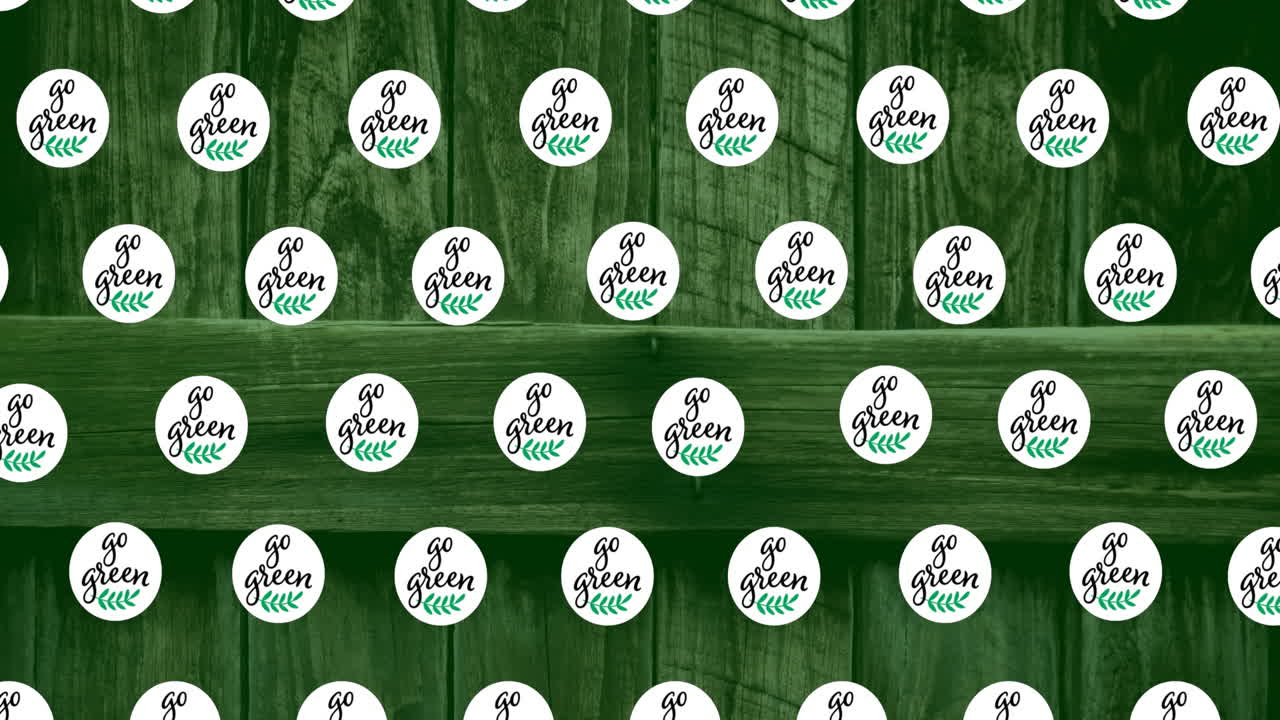 Animation of go green text over wooden background