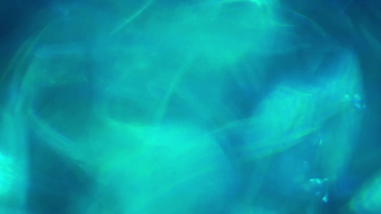 Fugas de luz abstractas que transicionan de verde a azul