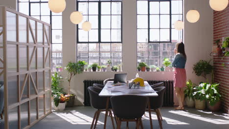 architect business woman looking at building construction engineer enjoying window view brainstorming creative ideas in modern office workplace