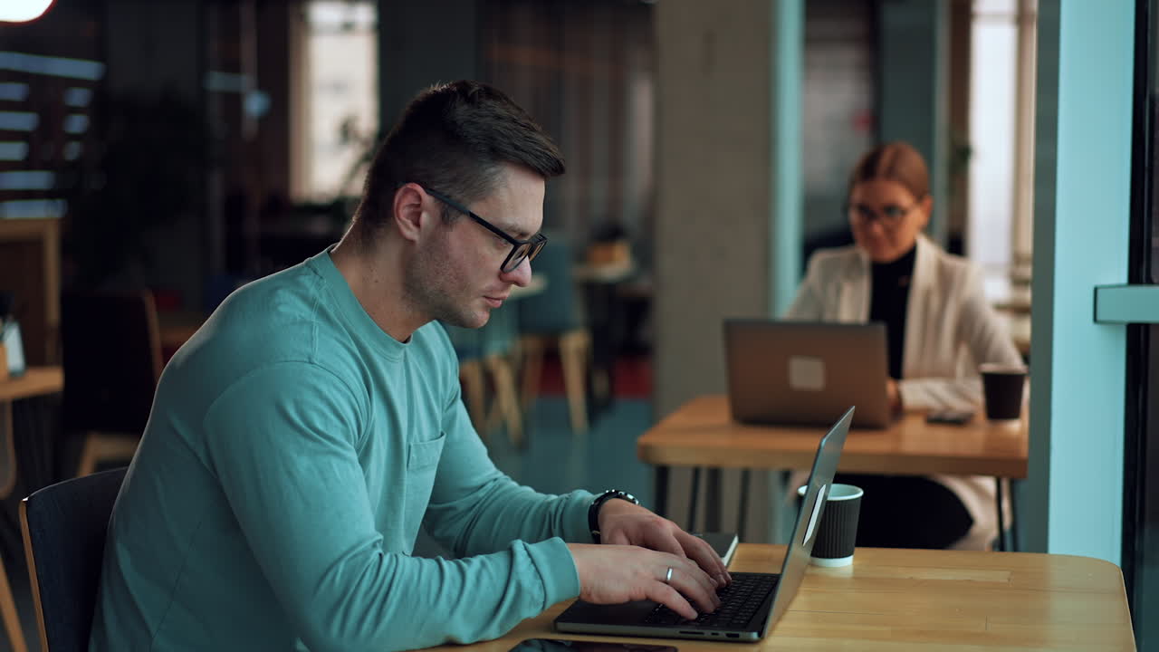Business People Working in a Modern Office Cafe