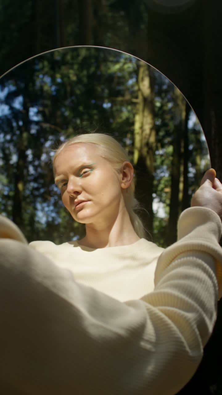 A Woman's Reflection in the Forest