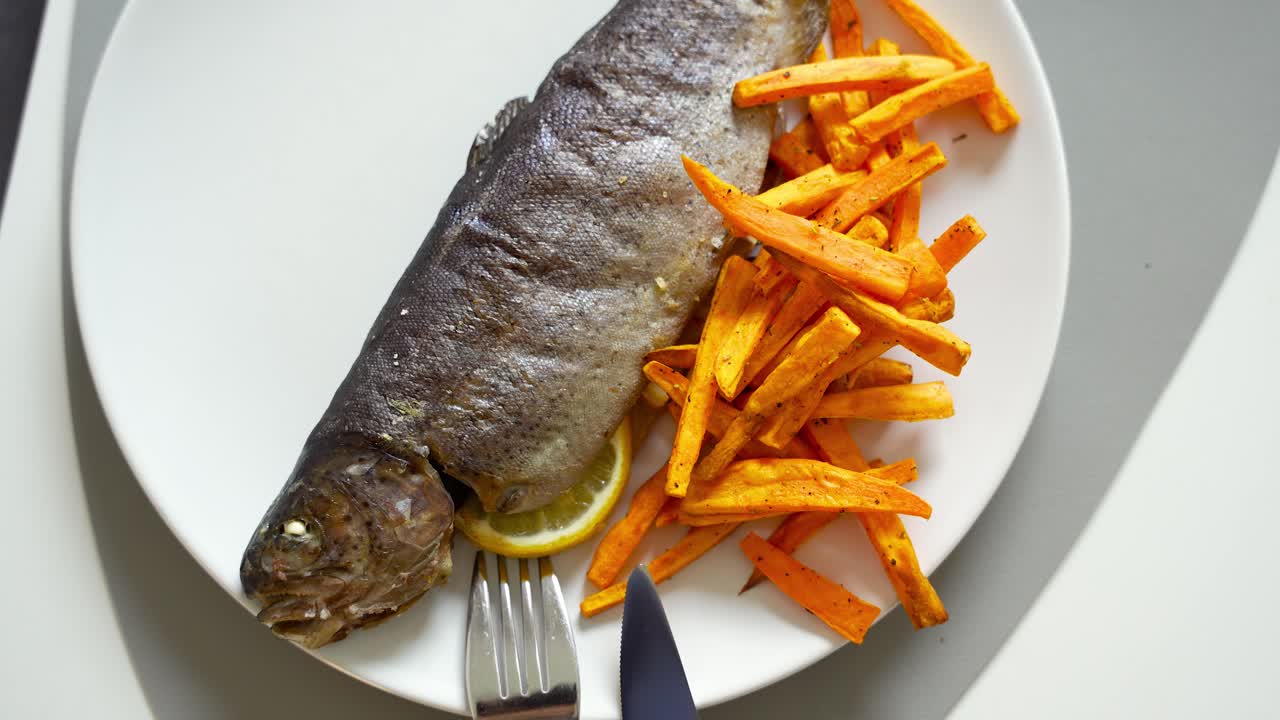 Slovenian Trout With Sweet Potato Fries - Close Up, Overhead Shot