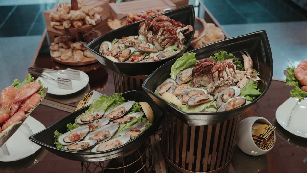 elegant seafood display with mussels crab and greens arranged on a gourmet buffet table