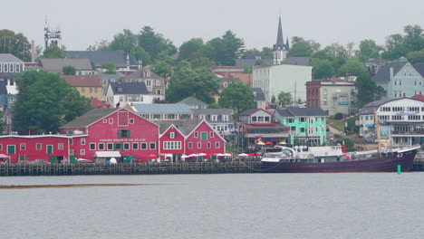 Small-colourful-community-town-in-Nova-Scotia,-Canada-on-an-overcast-day