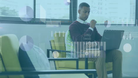 animation of statistical data processing over thoughtful african american man using laptop at office