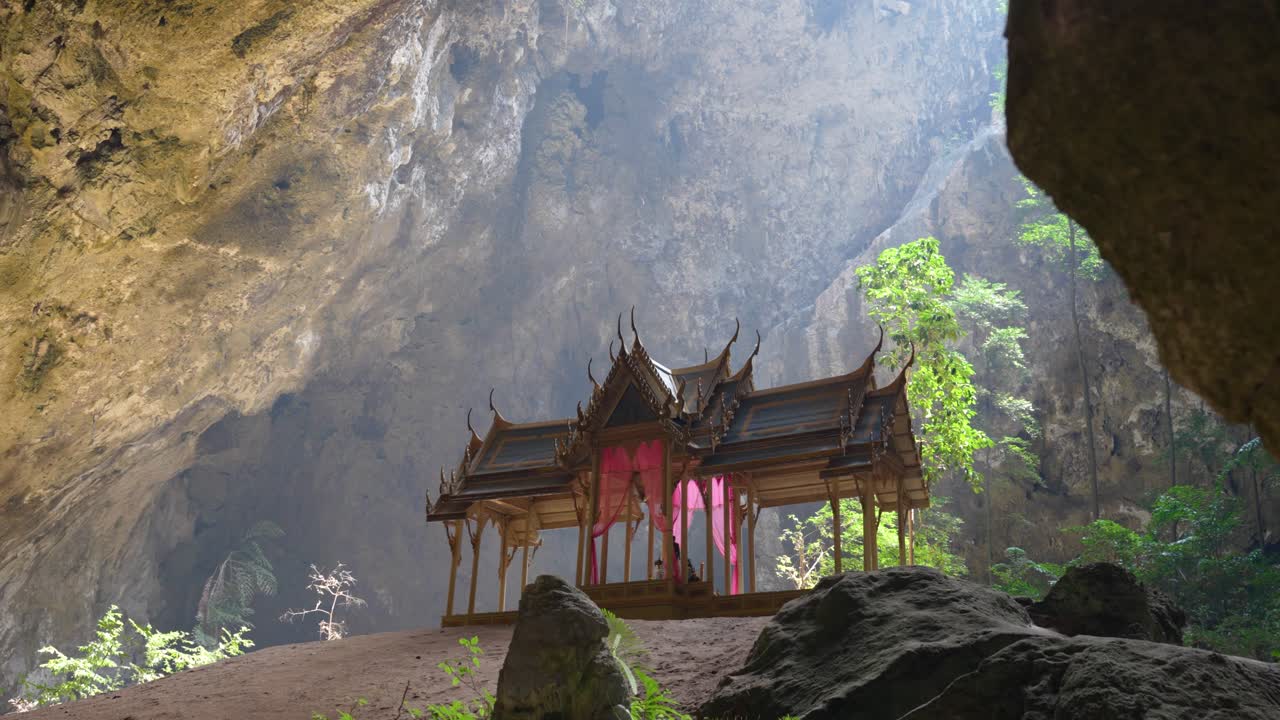 Pavilion in Phraya Nakhon Cave, Thailand, with sunbeam illuminating the temple