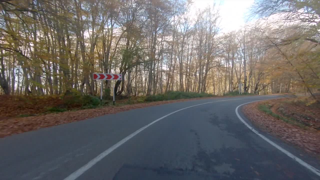 Driving on an empty road in Autumn