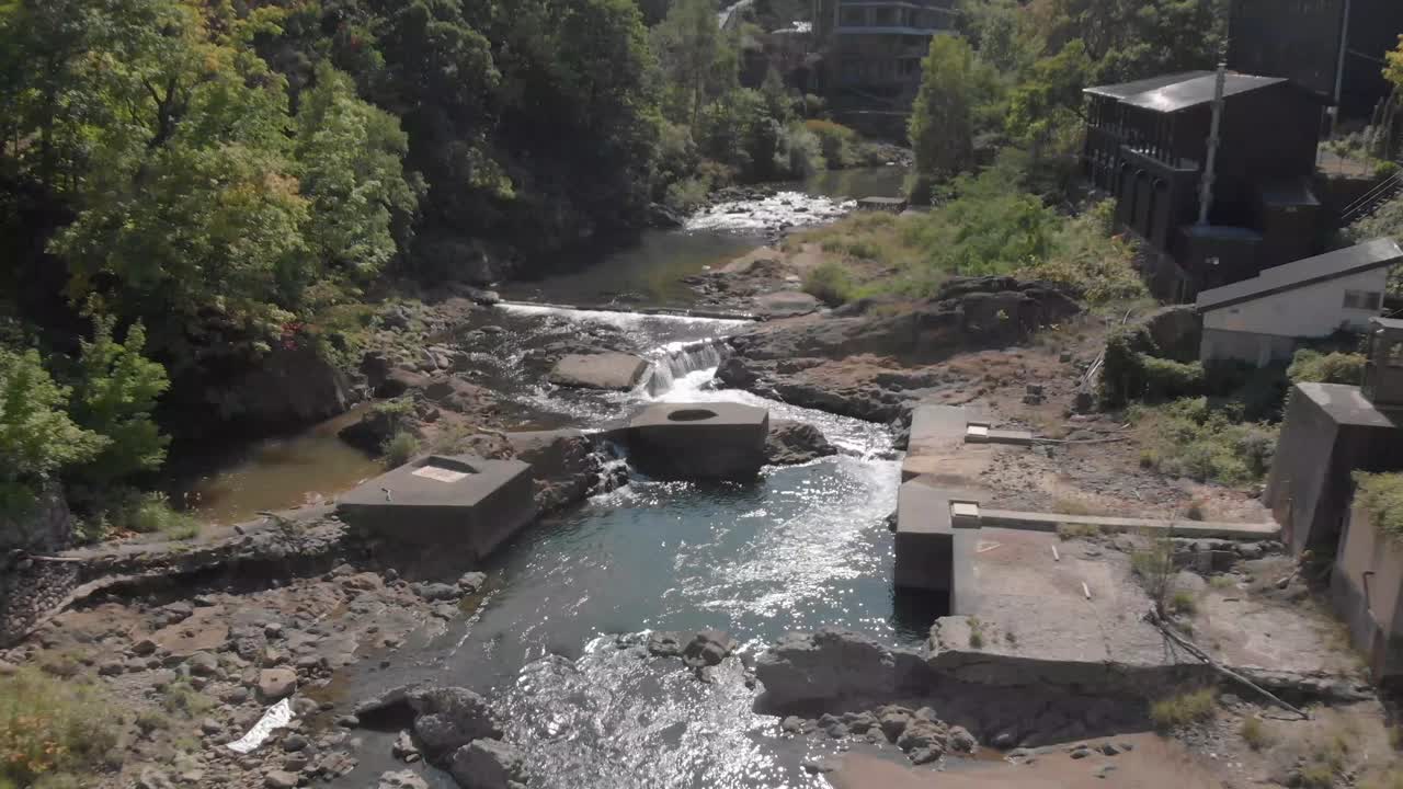River flowing through a mountain town